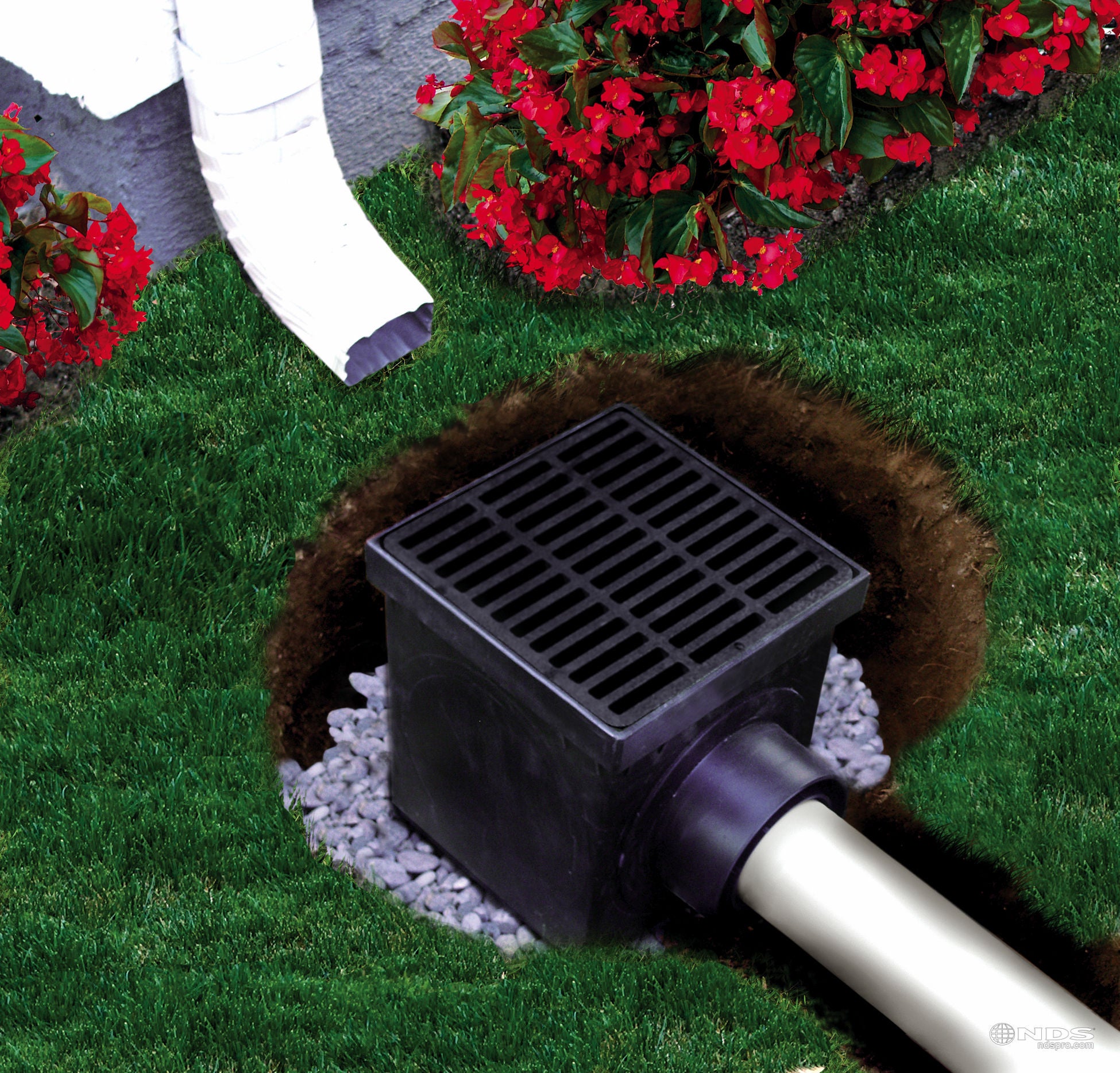 Cutaway view of NDS square drainage catch basin under downspout